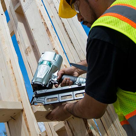Using a Hitachi NR83A5(S). This worker surely knows how to fix a framing nailer jam